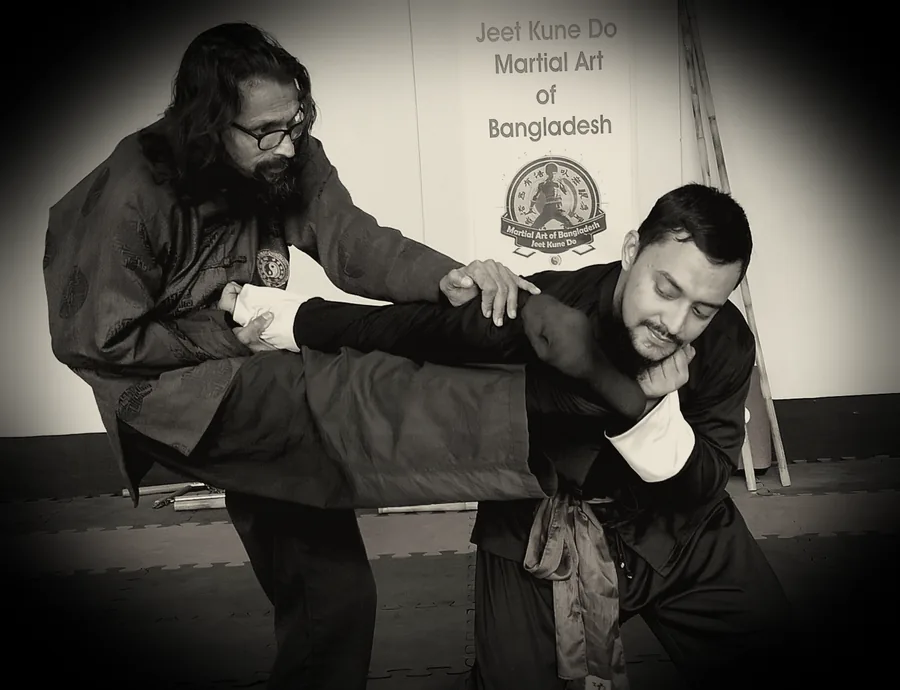 JKDBD students practising a close-range self-defence application on the training floor